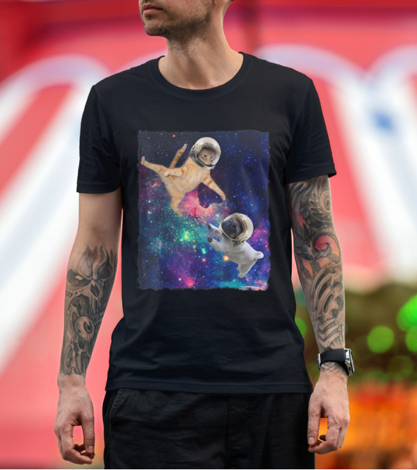 Premium T-Shirt: Cute Space Cat vs Pug Galaxy Epic Fight in Astronaut Helmets Floating in Cosmic Battle Scene T-Shirt Cute Space Cat vs Pug Galaxy Epic Fight in Astronaut Helmets Floating in Cosmic Battle Scene T-Shirt