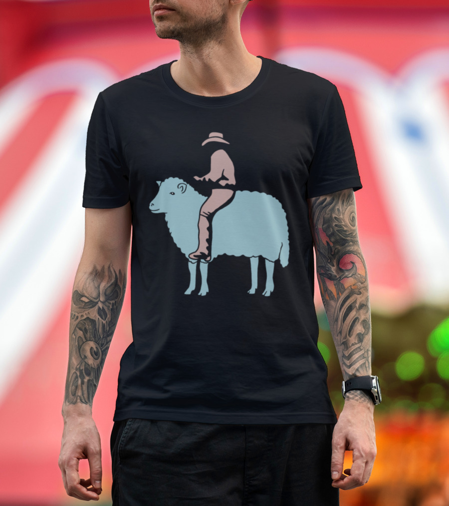 Cowboy Silhouette Riding Sheep Light Blue Background T-Shirt
