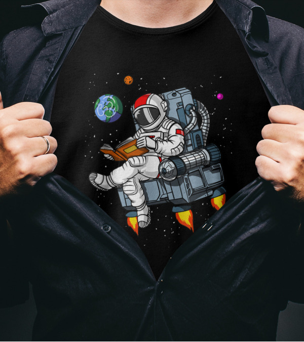 Space Astronaut Reading Book While Floating In Cosmic Galaxy With Planets T-Shirt