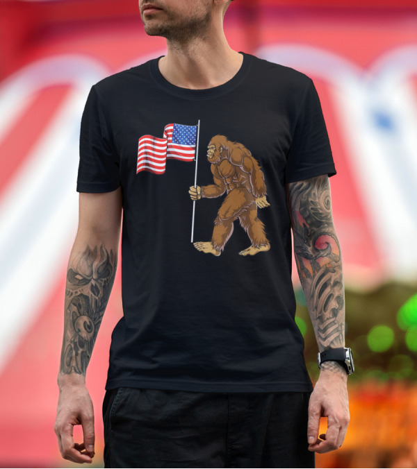 Premium T-Shirt: Bigfoot Carrying American Flag 4th of July Sasquatch T-Shirt Bigfoot Carrying American Flag 4th of July Sasquatch T-Shirt