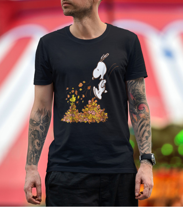 Premium T-Shirt: Peanuts Snoopy Jumping in Leaves with Woodstock Fall Fun T-Shirt Peanuts Snoopy Jumping in Leaves with Woodstock Fall Fun T-Shirt