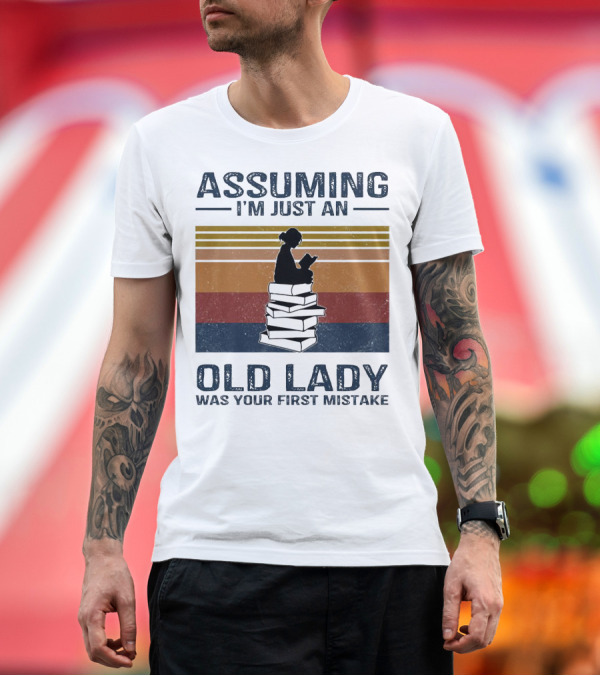 Premium T-Shirt: Assuming I'm Just an Old Lady Was Your First Mistake Sitting on Stack of Books Vintage T-Shirt Assuming I'm Just an Old Lady Was Your First Mistake Sitting on Stack of Books Vintage T-Shirt