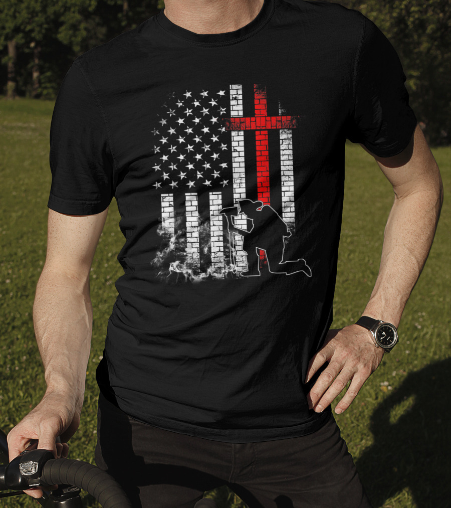 Fireman Kneeling With Axe Over American Flag And Thin Red Line Cross T-Shirt