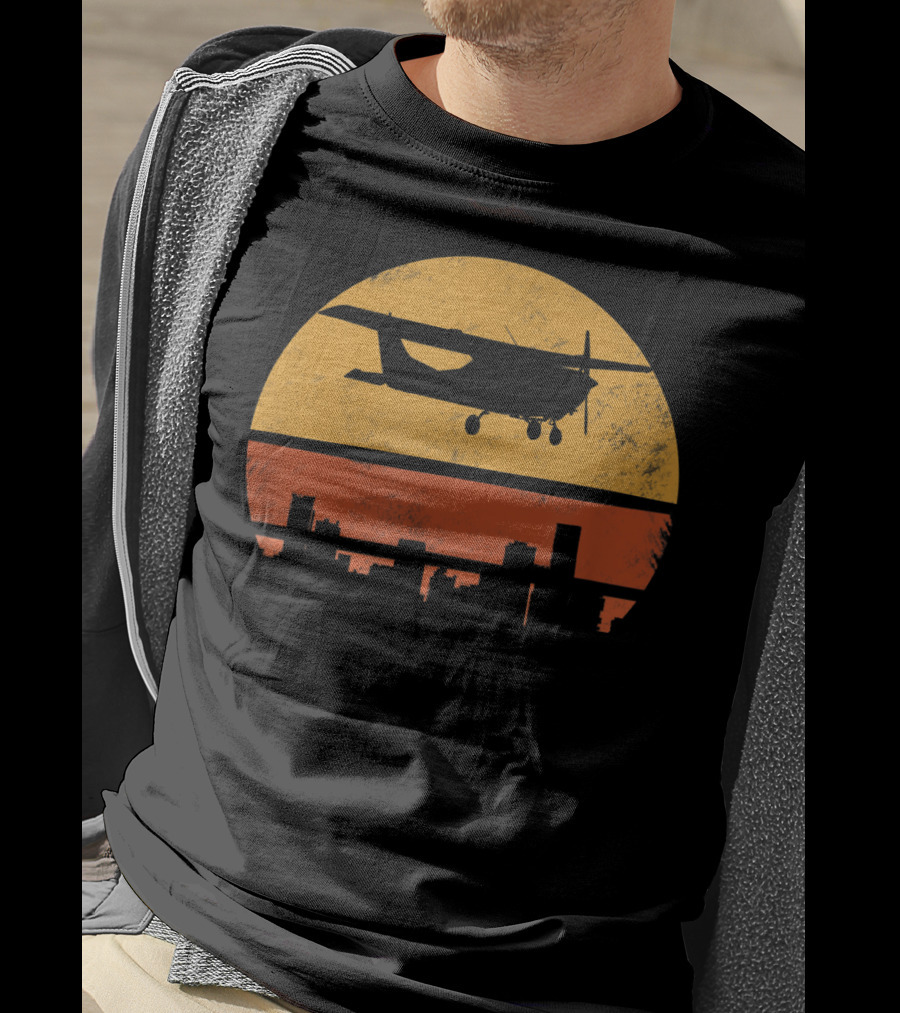Retro Pilot C172 Flying Silhouette Over Sunset Cityscape T-Shirt