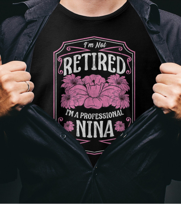 I'm Not Retired I'm A Professional Nina With Floral Accents And Pink Highlights T-Shirt