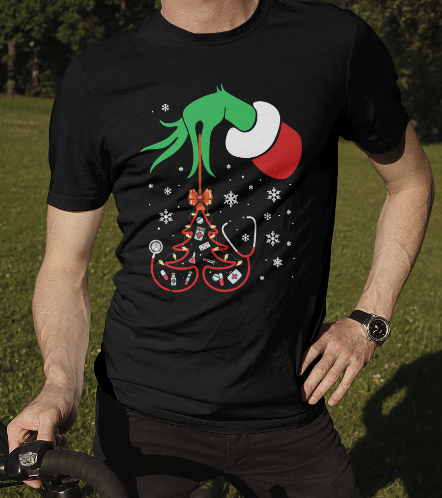 Grinch Hand Holding Nurse Themed Christmas Tree With Medical Icons T-Shirt
