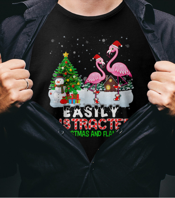 Easily Distracted By Christmas And Flamingos With Santa Hats In Snow Scene With Tree And Snowman T-Shirt