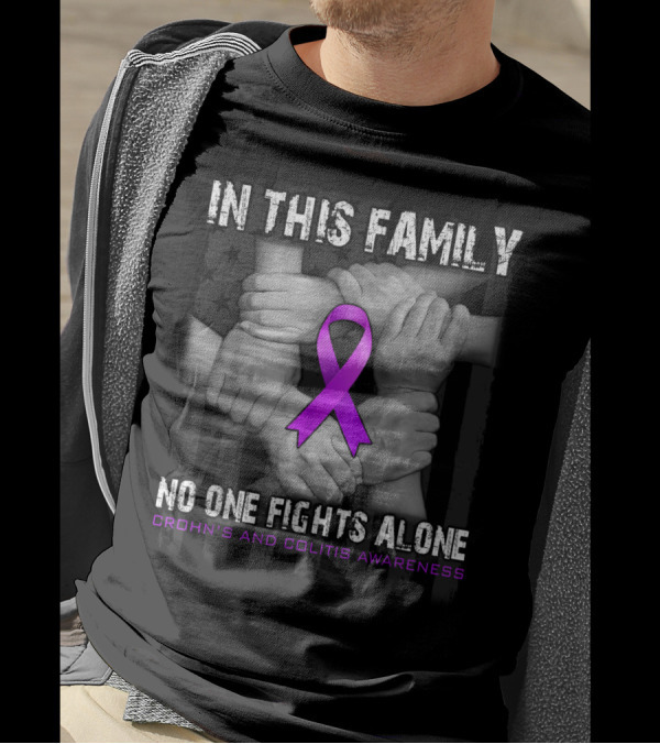 IN THIS FAMILY NO ONE FIGHTS ALONE CROHN'S AND COLITIS AWARENESS PURPLE RIBBON HANDS UNITED T-Shirt