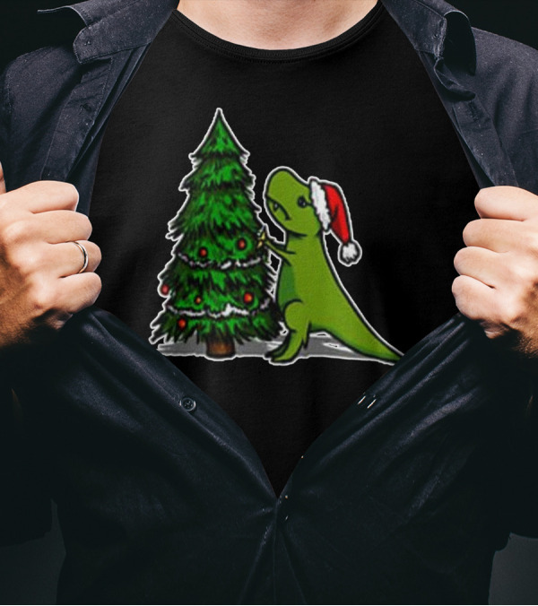 Funny Trex Dinosaur Struggling With Christmas Tree And Santa Hat T-Shirt