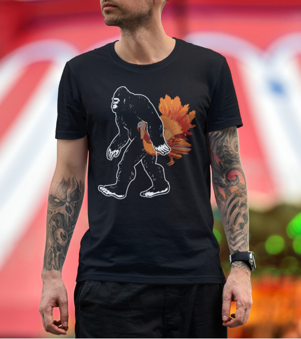 Premium T-Shirt: Sasquatch Bigfoot Carrying Turkey Silhouette with Vibrant Feathers T-Shirt Sasquatch Bigfoot Carrying Turkey Silhouette with Vibrant Feathers T-Shirt