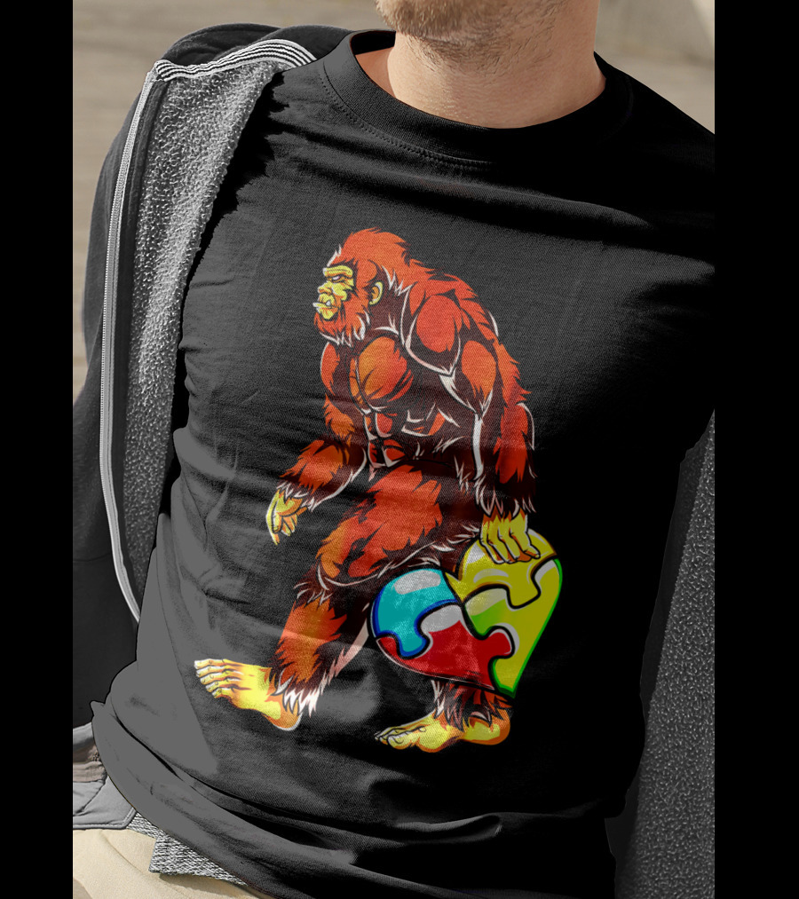 Bigfoot Holding Heart-Shaped Puzzle Piece For Autism Awareness T-Shirt