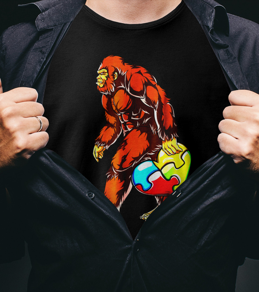 Bigfoot Holding Heart-Shaped Puzzle Piece For Autism Awareness T-Shirt