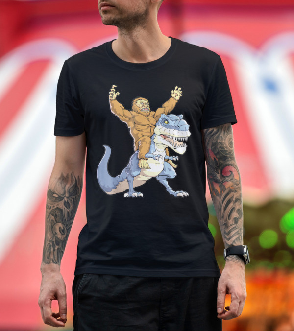 Premium T-Shirt: Bigfoot Sasquatch Riding Dinosaur Adventure T-Shirt Bigfoot Sasquatch Riding Dinosaur Adventure T-Shirt