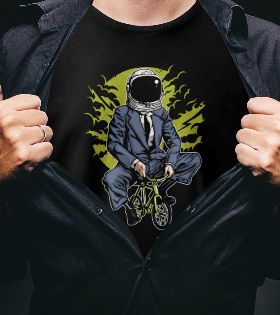 Astronaut In Business Suit Riding Mini Bike With Green Background And Stylized Sky Elements T-Shirt