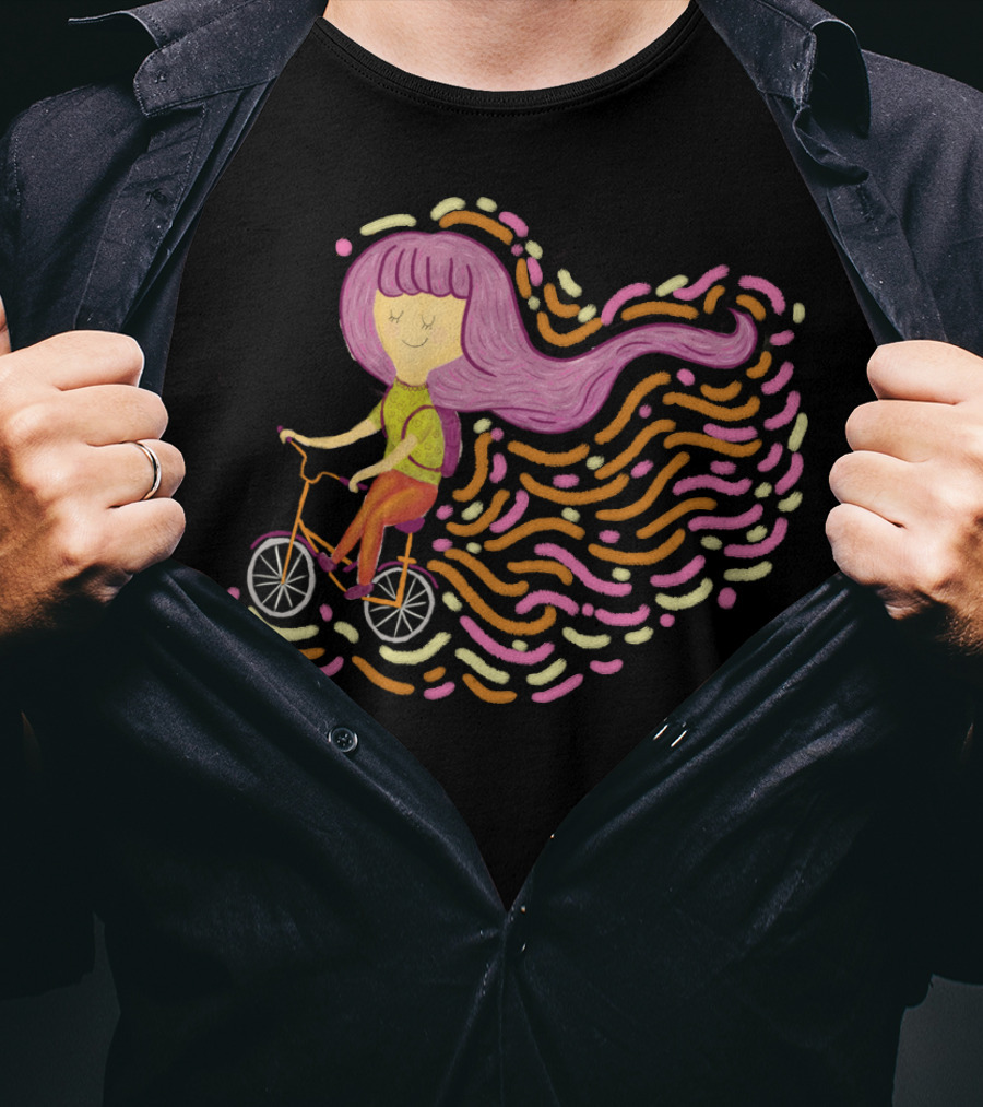 Claire Riding Bicycle With Flowing Pink Hair And Colorful Trails T-Shirt