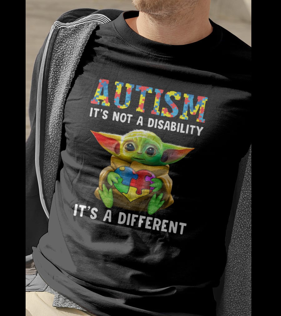 AUTISM IT'S NOT A DISABILITY IT'S A DIFFERENT Baby Yoda Holding Puzzle Piece T-Shirt