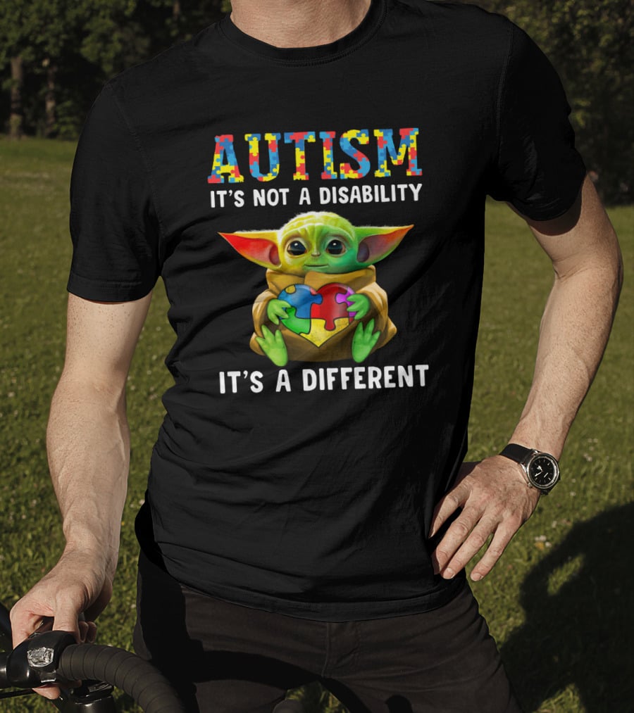 AUTISM IT'S NOT A DISABILITY IT'S A DIFFERENT Baby Yoda Holding Puzzle Piece T-Shirt