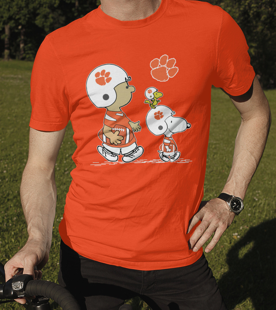 Clemson Tigers Snoopy Football Helmets And Paw Print Charlie Brown Woodstock T-Shirt