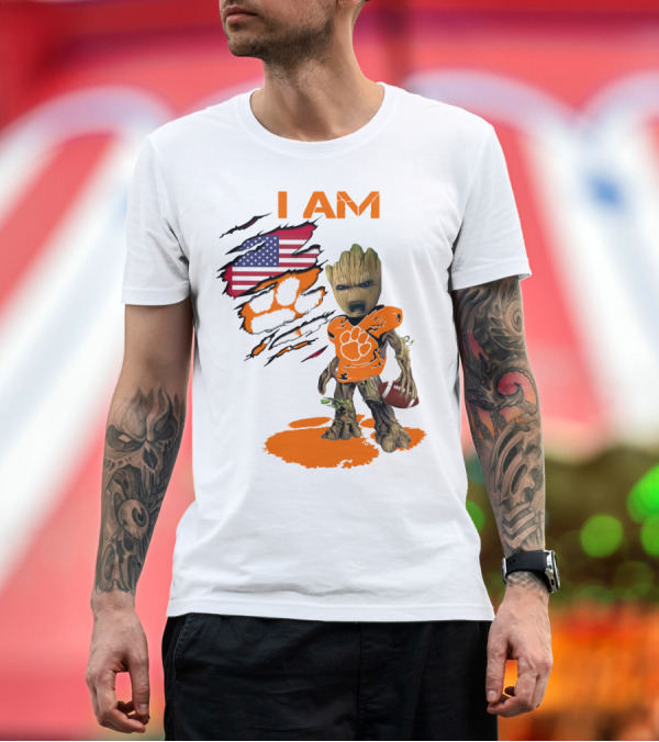 Premium T-Shirt: I AM Clemson Baby Groot American Flag Tiger Paw Football T-Shirt I AM Clemson Baby Groot American Flag Tiger Paw Football T-Shirt