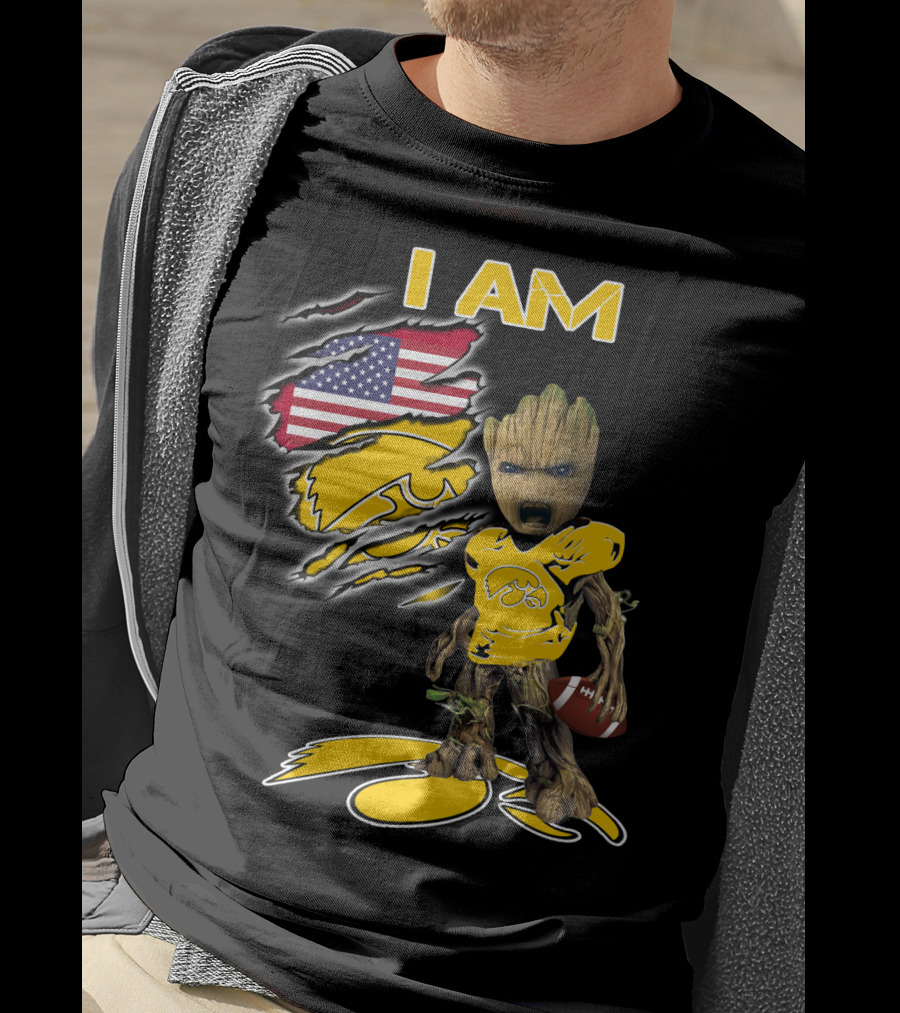 I Am Hawkeyes Baby Groot Holding Football With Usa Flag And Iowa Hawkeyes T-Shirt