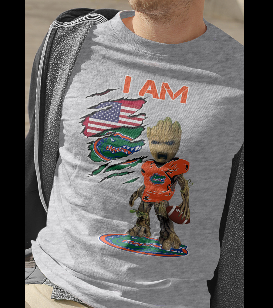 I Am Gators Baby Groot Holding Football With American Flag And Florida Gators T-Shirt