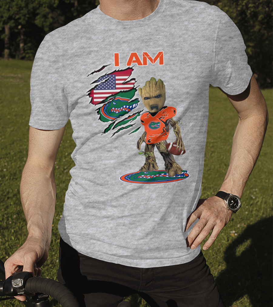 I Am Gators Baby Groot Holding Football With American Flag And Florida Gators T-Shirt