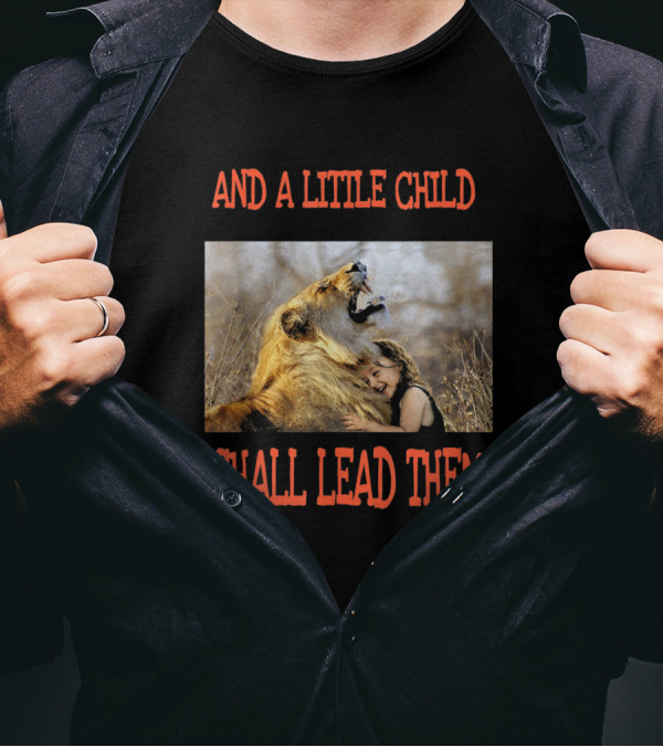 AND A LITTLE CHILD SHALL LEAD THEM Hugging A Lion In A Field T-Shirt
