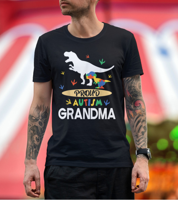Premium T-Shirt: Proud Autism Grandma Dinosaur Puzzle Footprints T-Shirt Proud Autism Grandma Dinosaur Puzzle Footprints T-Shirt