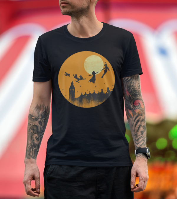 Premium T-Shirt: Disney Peter Pan and Darling Children Flying Silhouettes Against Orange Full Moon Over London Skyline T-Shirt Disney Peter Pan and Darling Children Flying Silhouettes Against Orange Full Moon Over London Skyline T-Shirt