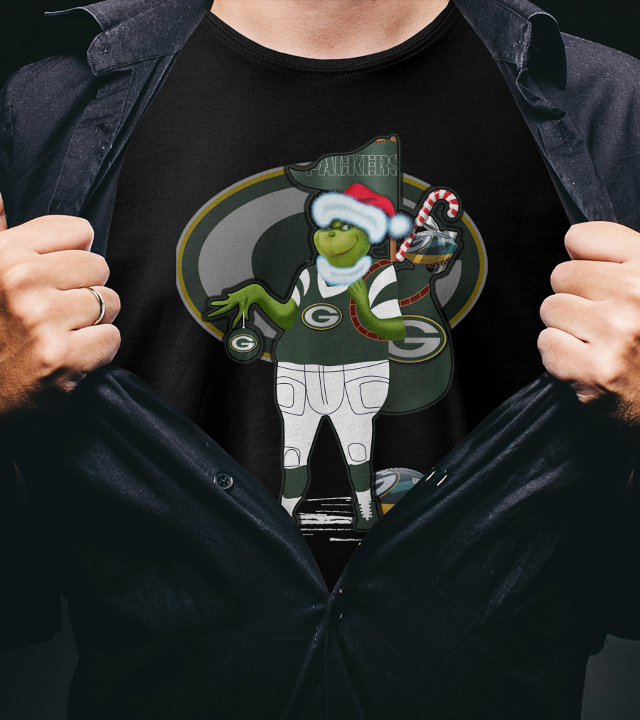 Grinchxmas Green Bay Packers Santa Hat Grinch Holding Helmet And Candy Cane T-Shirt