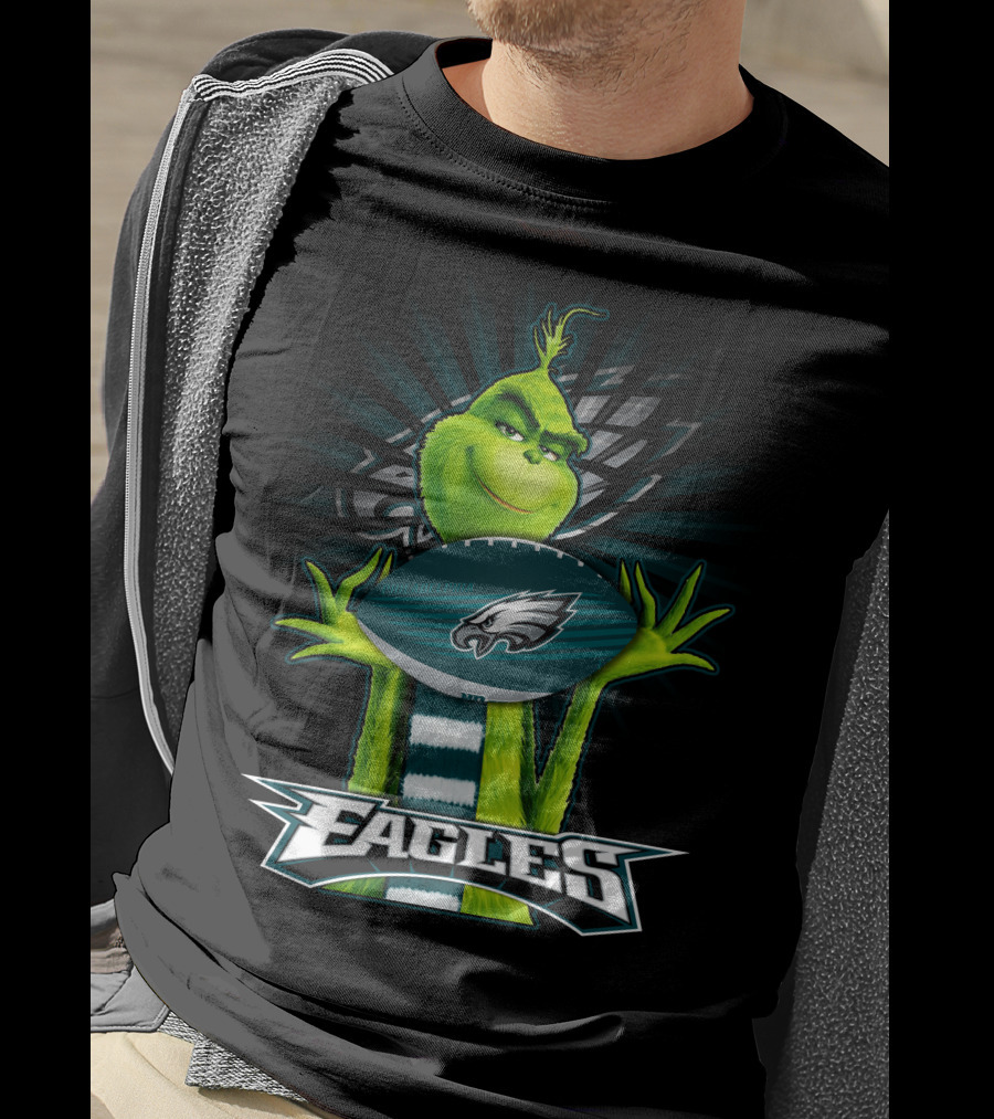 Grinch Holding Philadelphia Eagles Football With Team T-Shirt