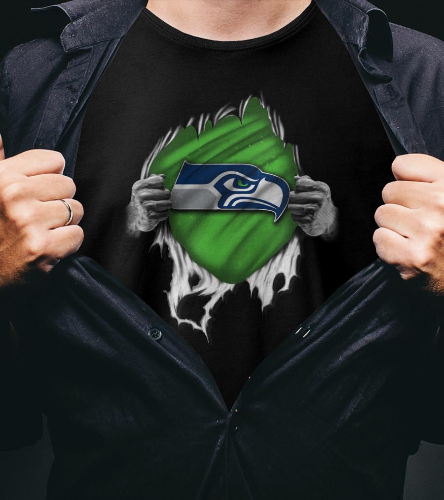 Torn Seattle Seahawks Logo With Green Background And Hands Peeling Fabric T-Shirt