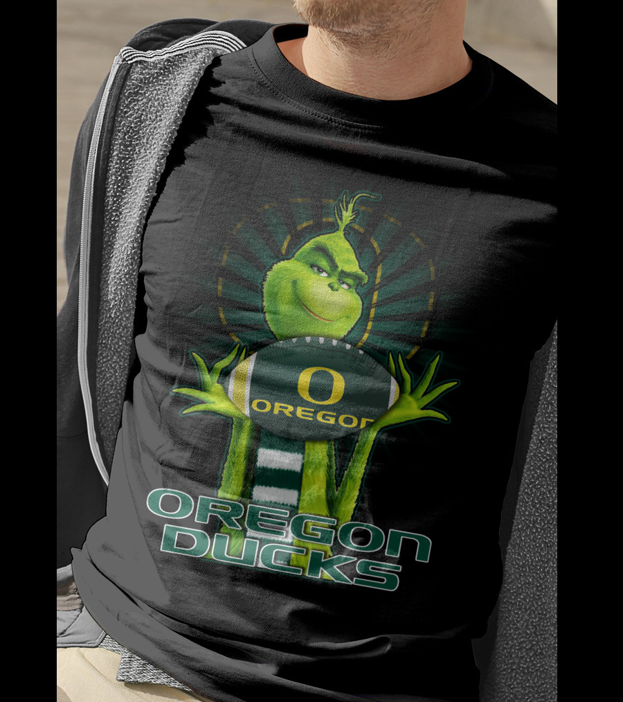 Grinch Holding Oregon Ducks Football T-Shirt