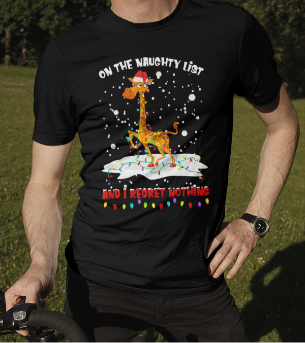 On The Naughty List And I Regret Nothing Giraffe Santa Hat Christmas Lights Snow T-Shirt
