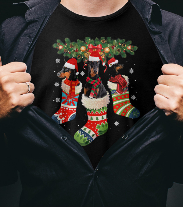 Three Doberman In Christmas Stockings With Santa Hats And Festive Decorations T-Shirt