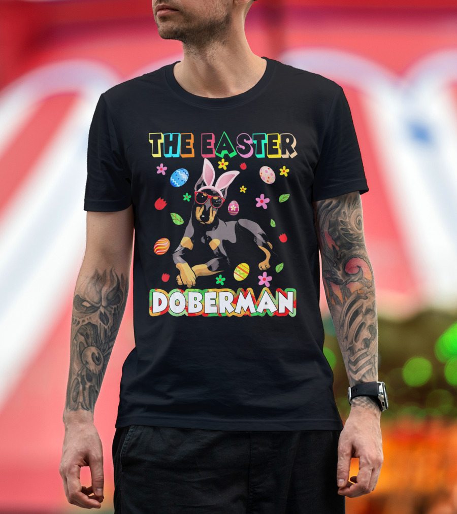 THE EASTER DOBERMAN Funny Dog wearing Bunny Ears and Sunglasses with Colorful Eggs and Flowers T-Shirt