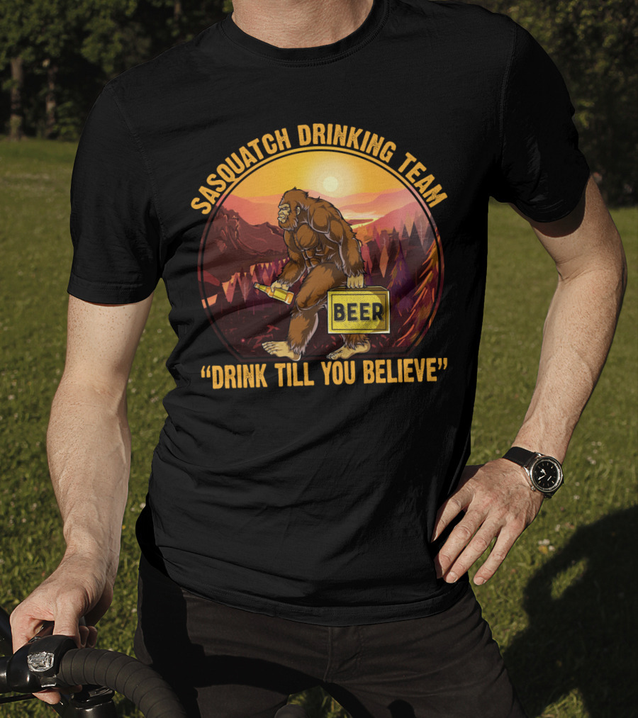 Sasquatch Drinking Team Beer Wilderness Sunset Funny Bigfoot Drink Till You Believe T-Shirt