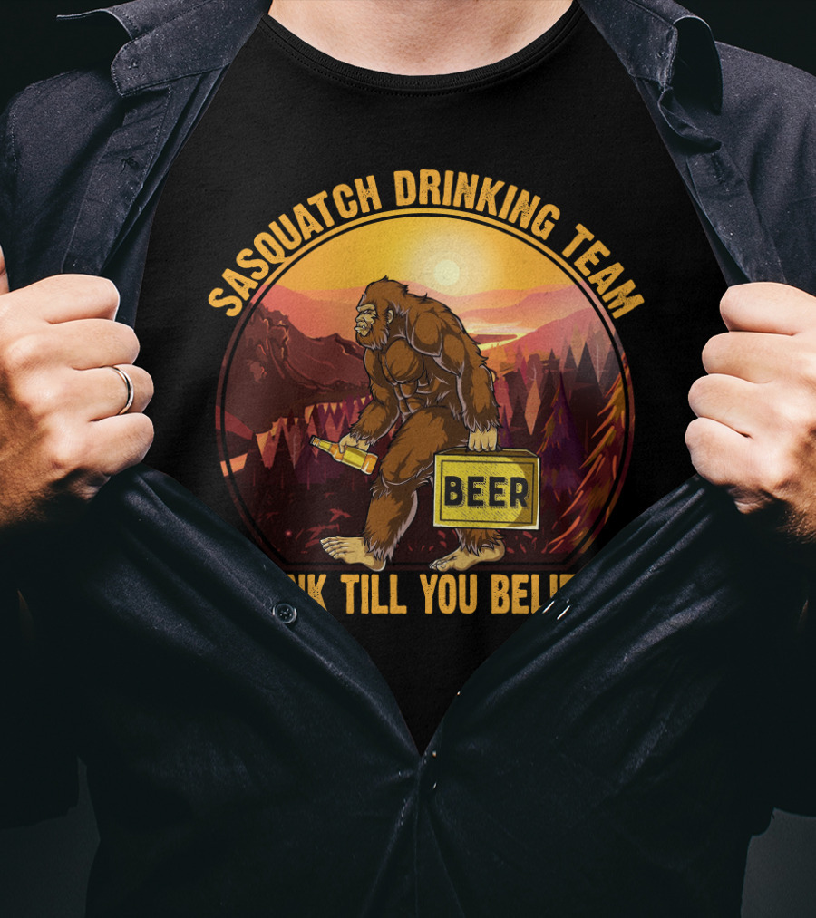 Sasquatch Drinking Team Beer Wilderness Sunset Funny Bigfoot Drink Till You Believe T-Shirt