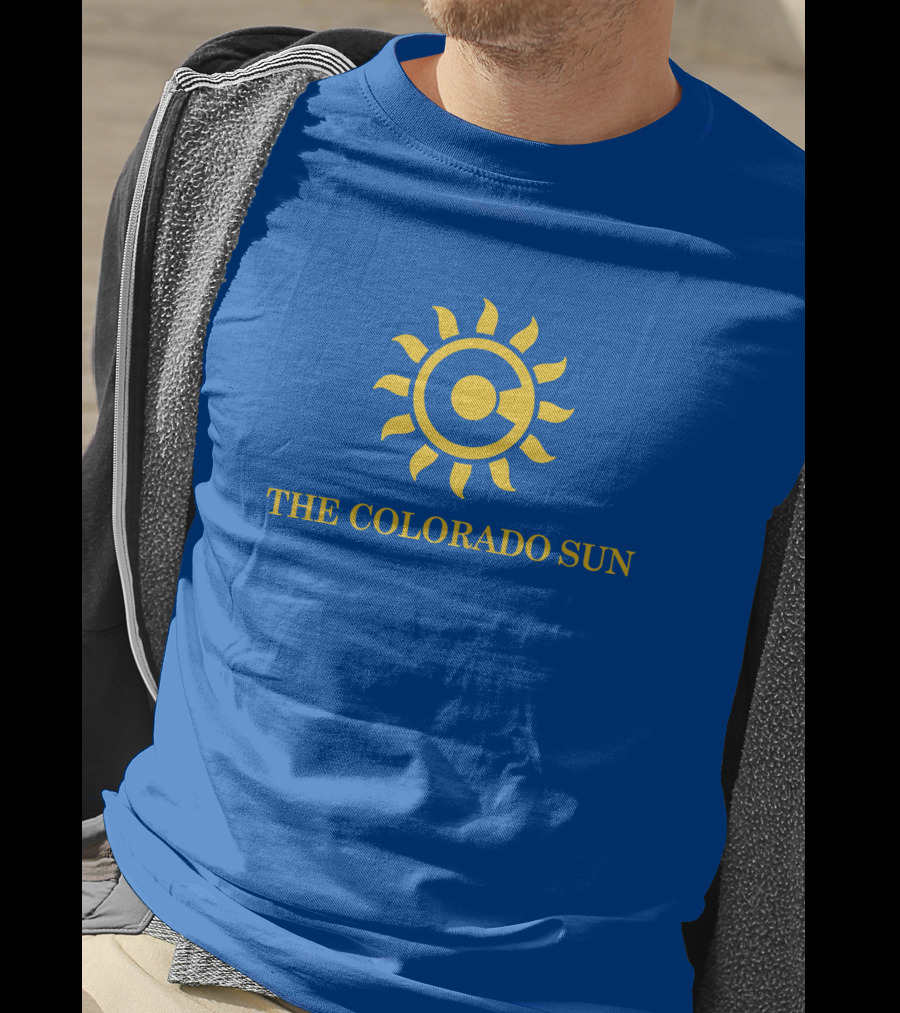 The Colorado Sun Merch Colorado Sun Logo Yellow Sunburst Blue Background T-Shirt