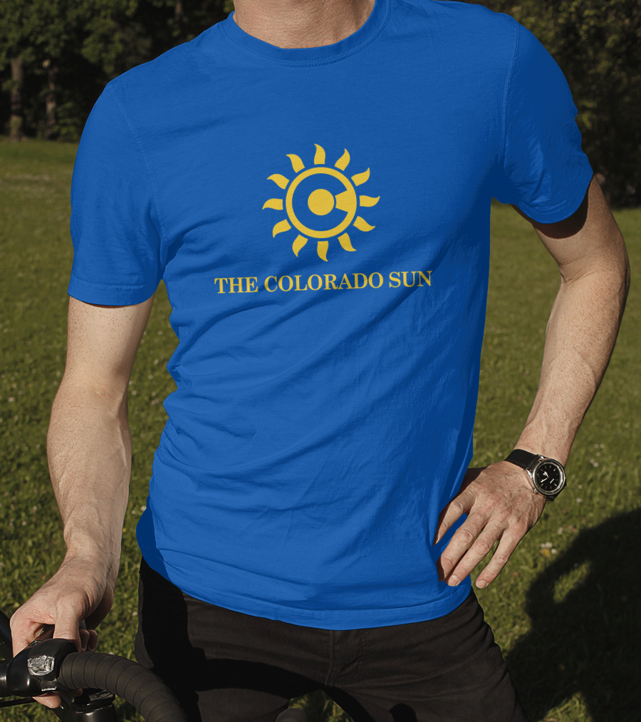 The Colorado Sun Merch Colorado Sun Logo Yellow Sunburst Blue Background T-Shirt