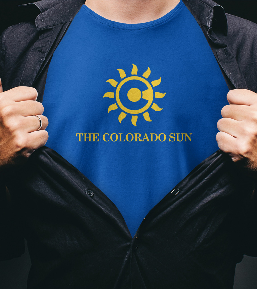 The Colorado Sun Merch Colorado Sun Logo Yellow Sunburst Blue Background T-Shirt