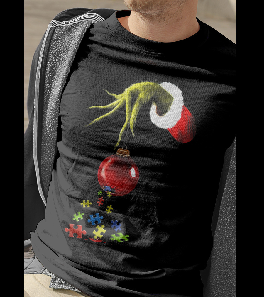Grinch Hand Holding Red Ornament With Autism Puzzle Pieces T-Shirt