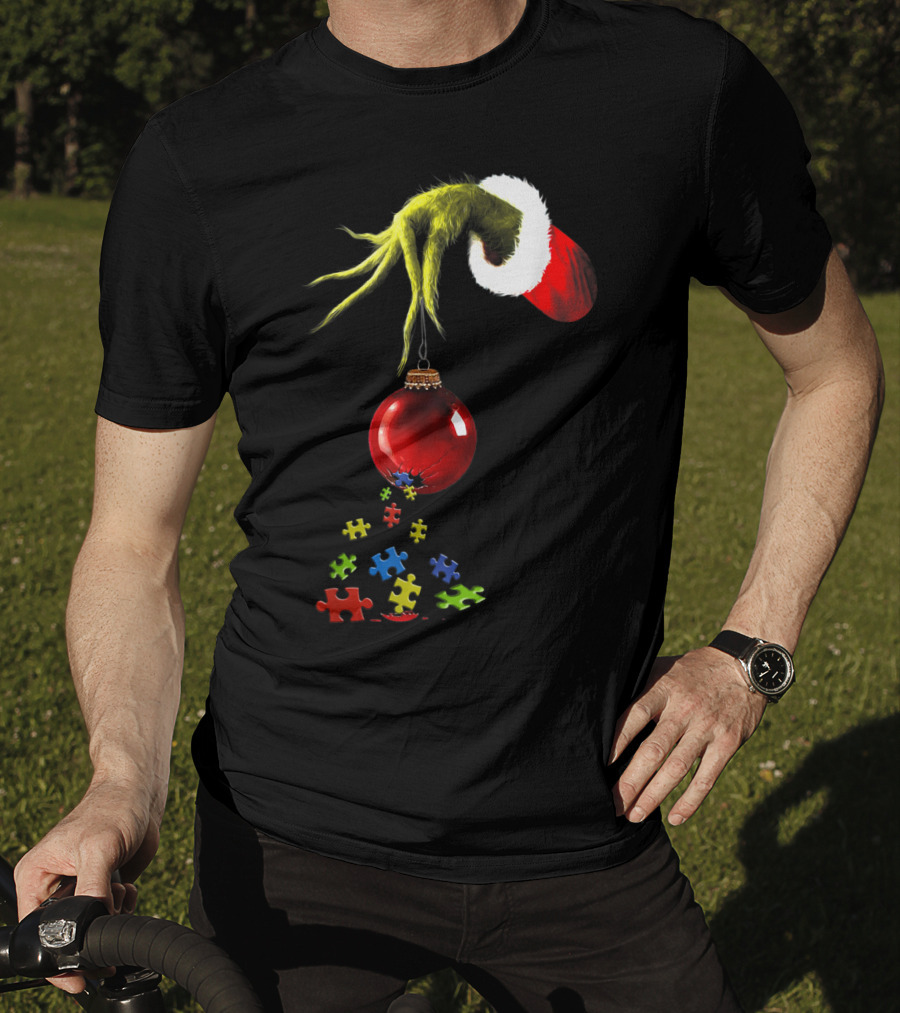 Grinch Hand Holding Red Ornament With Autism Puzzle Pieces T-Shirt