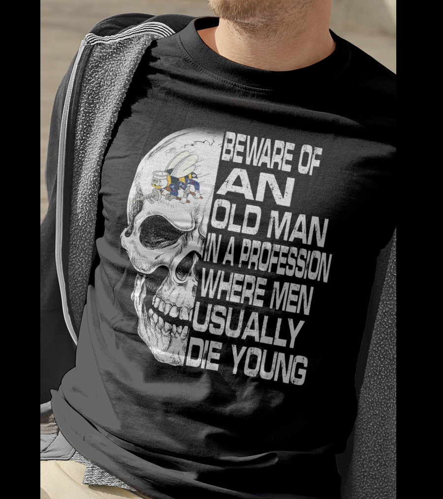 Beware Of An Old Man In A Profession Where Men Usually Die Young Skull With Cap And Glasses T-Shirt