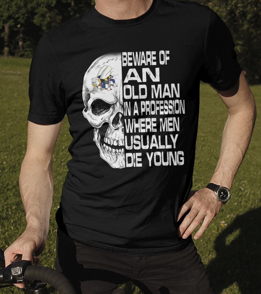 Beware Of An Old Man In A Profession Where Men Usually Die Young Skull With Cap And Glasses T-Shirt