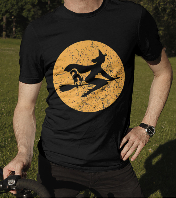 Witch On A Broomstick With Cat Silhouette Against Moon Background T-Shirt