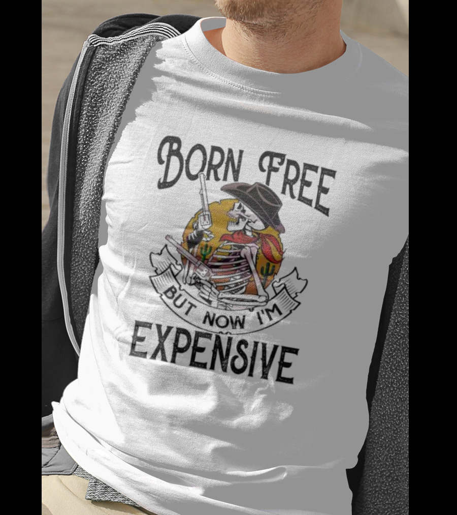 Skeleton Cowboy Born Free But Now I'm Expensive With Gun And Cactus Background T-Shirt