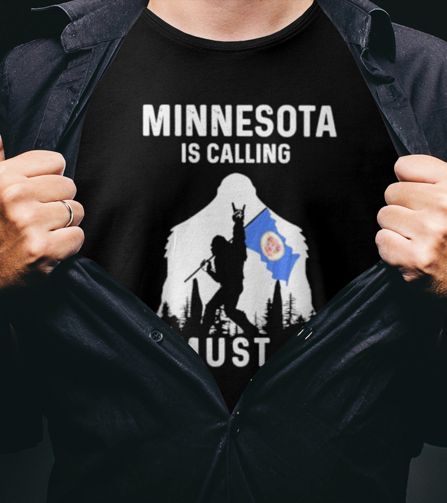 Minnesota Is Calling I Must Go Bigfoot Silhouette With Flag T-Shirt