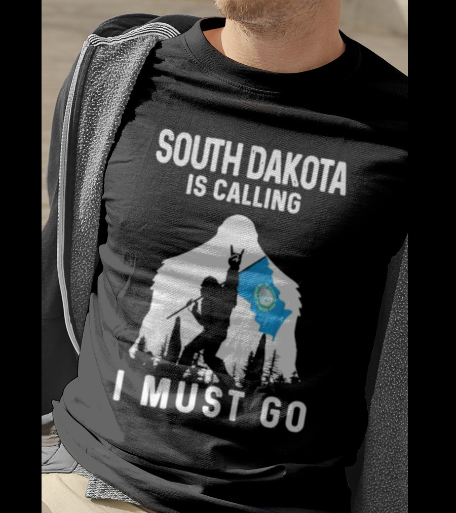 South Dakota Is Calling I Must Go Bigfoot Holding South Dakota Flag T-Shirt