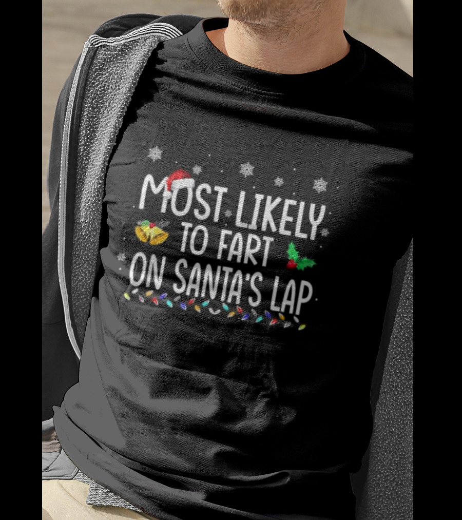 Most Likely To Fart On Santa’s Lap Christmas Holiday Family Humor Santa Hat Snowflakes Lights T-Shirt